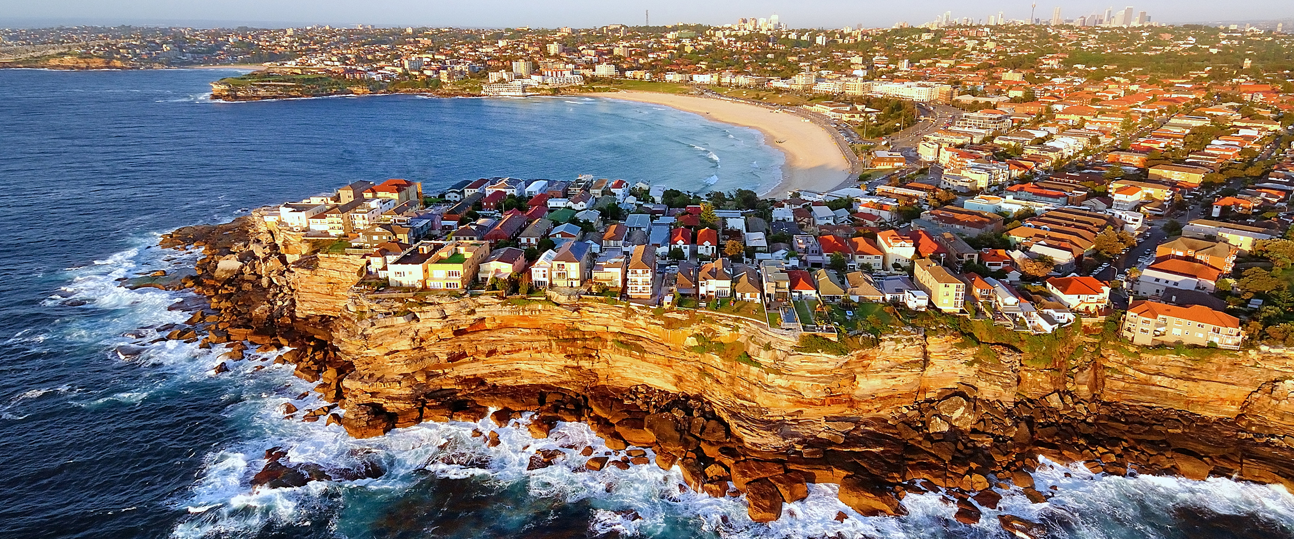 Houses on cliff coastline