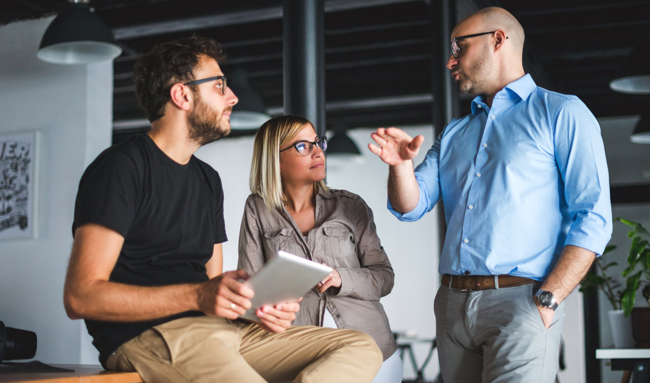 People in office talking